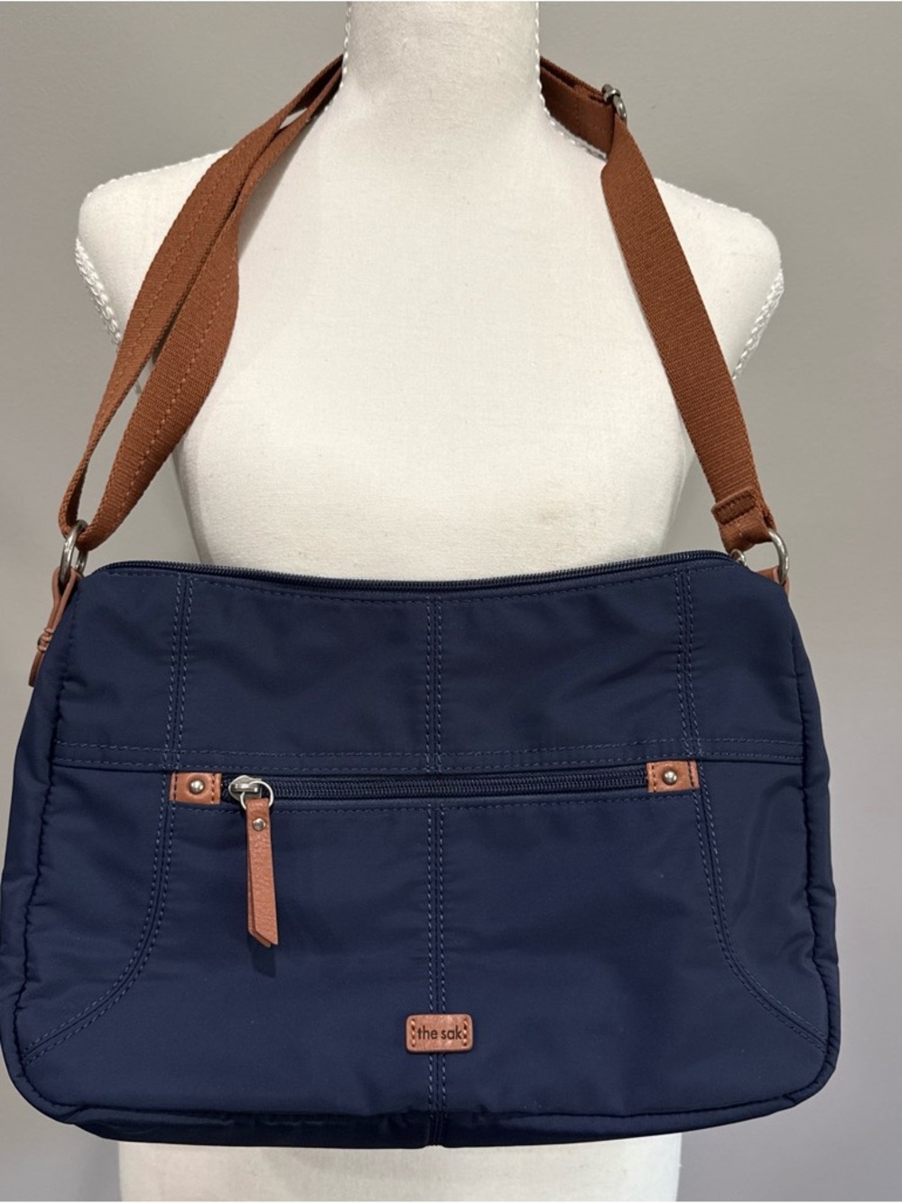 The Sak Navy Shoulder Bag with Brown Strap